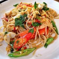 Spaghetti Basil · Stir-fried spaghetti in hot chili sauce with basil, mushrooms, broccoli, baby corns, bell pe...