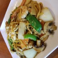 House Curry Noodles · Stir-fried egg noodles in black bean sauce and curry powder with chicken, prawns, eggs, mush...