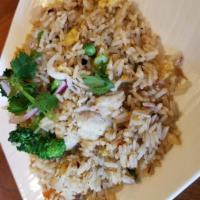 Fried Rice · Choice of meat stir-fried with eggs, broccoli, carrot, peas, onions, green onions, and rice.