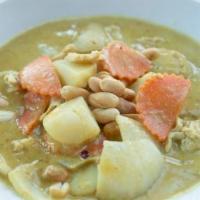 Yellow Curry · Yellow curry with coconut milk, potatoes, carrots, onions, peanuts, and choice of meat. Serv...