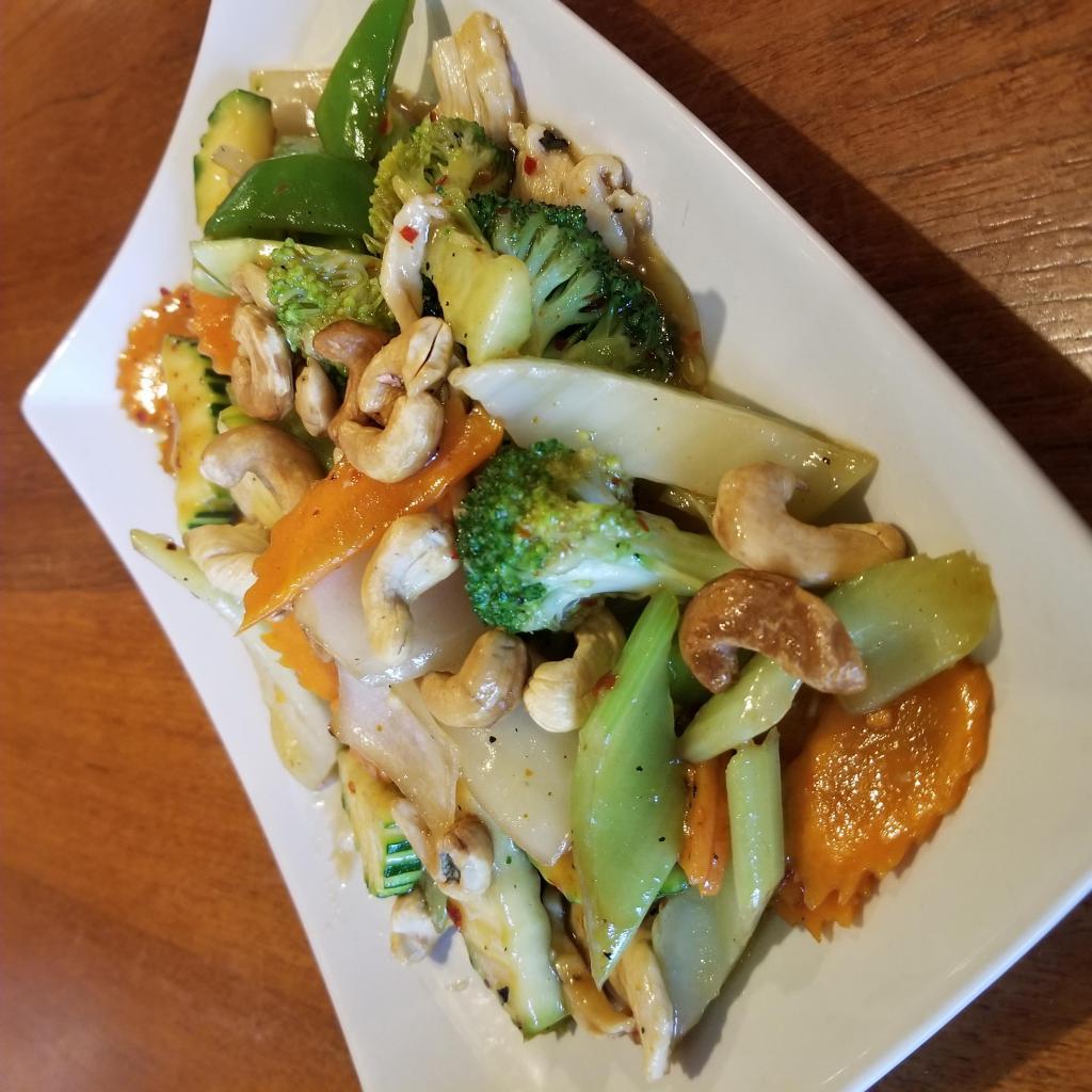 Pad Cashew · Choice of meat stir-fried with cashew nuts, onions, zucchini, broccoli, celery, bell peppers, and carrots. Served with steamed rice.