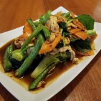 Pad Jungle · Choice of meat stir-fried with chili paste, green beans, broccoli, hot peppers, spinach, car...