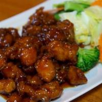 Crispy Orange Chicken · Crispy-fried chicken in house special orange sauce, serve with steamed broccoli, carrots, an...