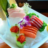 Triple Color Sashimi · Fifteen pieces of tuna, salmon, and yellowtail. Served with miso soup or green salad.