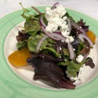 Beet Salad · Served with baby mixed green, red onions, goat cheese and balsamic vinaigrette.