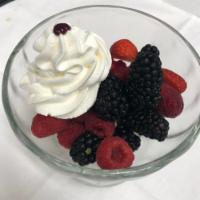 Organic Fresh Berries · blackberry, blueberry and raspberry served with whipped cream and creme de cassis.