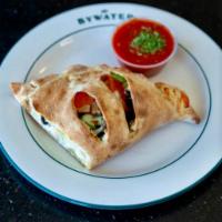 Vegetarian Calzone · Ricotta and mozzarella cheeses, sliced tomato, black olives, mushrooms, green peppers and on...