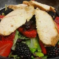 Chicken Berry Salad · Chicken breast, fresh berries, Gorgonzola cheese, pecans and dried cranberries over mixed gr...