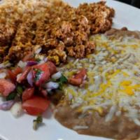 Huevos con Chorizo · Eggs with pork chorizo. Served with rice, beans or papas and your choice of tortillas.
