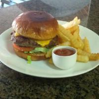 Hamburger · 1/2 lb. hand pattied served with lettuce, tomato, onion, and dill pickle slices on a brioche...