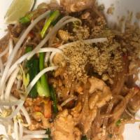 19. Pad Thai · Thin rice noodles stir-fried with choice of protein, sliced red bean curd, crushed peanuts, ...
