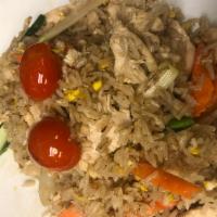 23. Fried Rice · Choice of protein, stir-fried with steamed rice, egg, carrots, onions, scallions and tomato.
