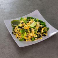Woodstock Salad · Artichoke hearts, brown rice, black beans, sweet corn, baby spinach, cilantro pesto and ched...
