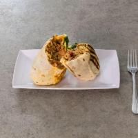 Lonestar Burrito · Texas-style ground beef, refried beans, spinach rice, steamed fajita vegetable mix, diced ja...