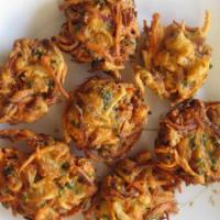 Vegetable Pakora · Assorted special vegetables deep-fried with spices and chickpea batter.