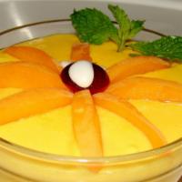 Mango Custard · Seasonal fresh fruits with mango pulp and ice cream.