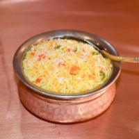 Saffron Rice · Saffron rice is a dish made from saffron, basmati rice, cashews raisins, green peas & topped...