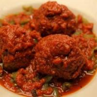 Meatballs and Peppers Dinner · 3 meatballs with green peppers and meat sauce.