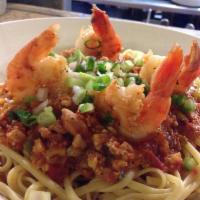 Spicy Seafood Pasta Dinner · Linguine, clams, and shrimp in a spicy red clam sauce.