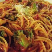 Spaghetti and Broccoli Dinner · Cooked with butter, onions, broccoli, marinara sauce, chopped parsley and parmesan cheese.