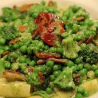 Pesto Rigatoni Dinner · Rigatoni, broccoli, and peas, in pesto sauce.