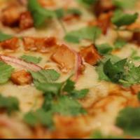 BBQ Chicken Pizza · BBQ sauce, chicken, red onions and cilantro.