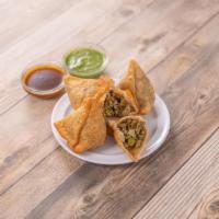6. Lamb Samosa · 4 pieces. Small crispy turnovers stuffed with minced meat and peas.
