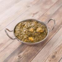 79. Saag Paneer · Spinach cooked with herbs and homemade cheese.