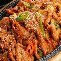 Grilled Spicy Pork · Served with steamed rice, miso soup, and sides (banchan).