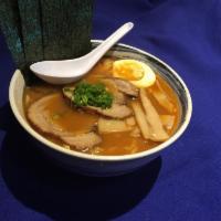 11. Ramen · Ramen soup with egg, fishcake, slice of pork and green onion.