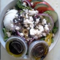 Greek Salad · Tomato, cucumber, crumbled feta, black and green olives, red onion and pepperoncini on romai...