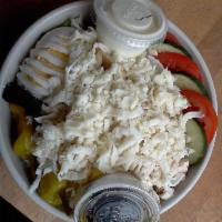 Mojo Chicken Salad · Roasted chicken breast, tomato, cucumber, fresh mushroom, onions topped with mozzarella.