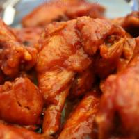 32 Wings · Crispy and delicious jumbo chicken wings, deep fried to golden brown perfection. Served in c...