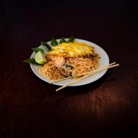 Shrimp Pad Thai · Thai rice noodles with eggs, roasted peanuts, scallions, dried bean curd, fresh bean sprouts...
