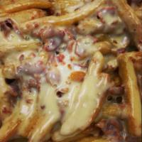 Barrel Fries · Topped with mozzarella, bacon and ranch dressing.