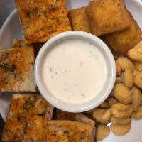 Alfredo Appetizer · Fried ravioli, fried gnocchi and garlic bread served with a side of our creamy Alfredo sauce...