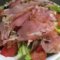 Antipasto Salad · Lettuce topped with black olives, tuna, sharp provolone, roasted peppers, anchovies, tomatoe...