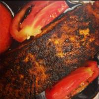 Blackened Salmon · With tomatoes and balsamic glaze and side of pasta. Includes tossed salad and bread.