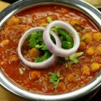 24. Channa Masala · Chickpeas in homemade onion tomatoes sauce. Vegan.