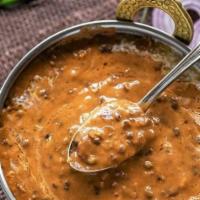 29. Daal Makhni · Creamy black lentil, herbs and spices.