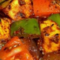 36. Kadai Paneer · Indian cheese, bell pepper, tomato and onion sauce.