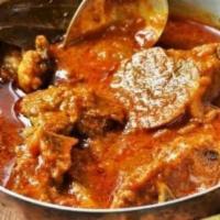 67. Lamb Curry · Boneless lamb in homemade curry sauce and spices.