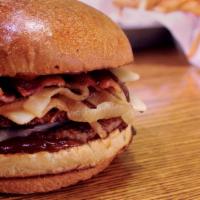 MOOV It, Tex Burger · All-natural pepper jack, Applewood smoked bacon, smoked BBQ sauce, grilled onions and brioche.