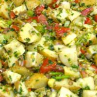Mediterranean Potato Salad · Chunky with garlic and olives. Made without mayo.