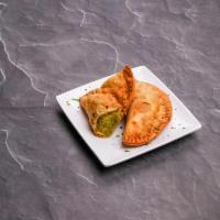 2 Piece Samosa · Deep fried pastry filled with potatoes and herbs.