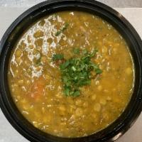 Lunch Surti Dal Yellow Lentil · Yellow lentils cooked with rare herbs and spices. Vegetarian.