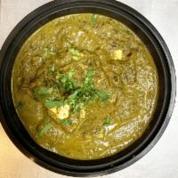 Palak Paneer · Fresh cottage cheese cubes in spicy spinach sauce. Vegetarian.