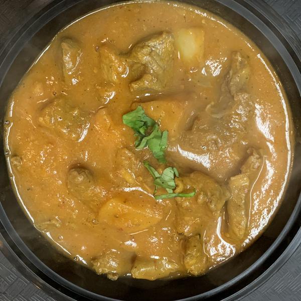 Fish Vindaloo · A traditional dish from the south of india, cooked in a spicy tangy sauce. Fish and potato.