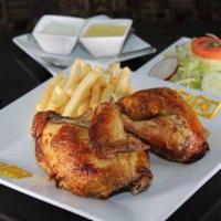 HALF CHICKEN · Peruvian Rotisserie Chicken. Salad Included when you choose a side. 
Comes with one small ye...