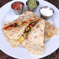 Grilled Veggie Quesadilla · Jack and cheddar cheeses, pico de gallo, guacamole and sour cream.